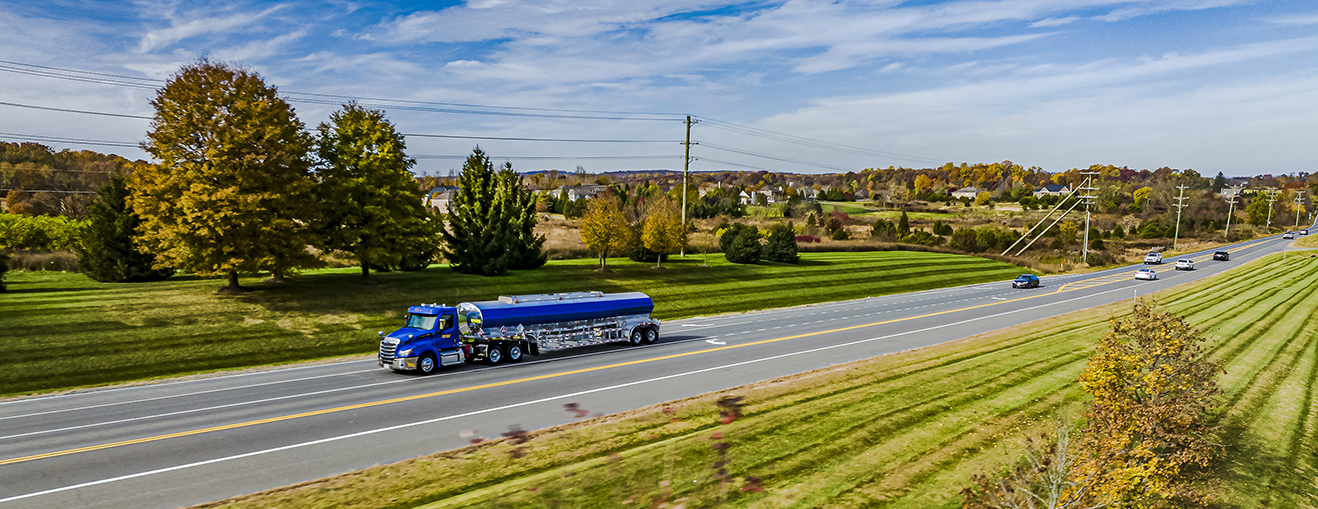 Blue fuel delivery truck