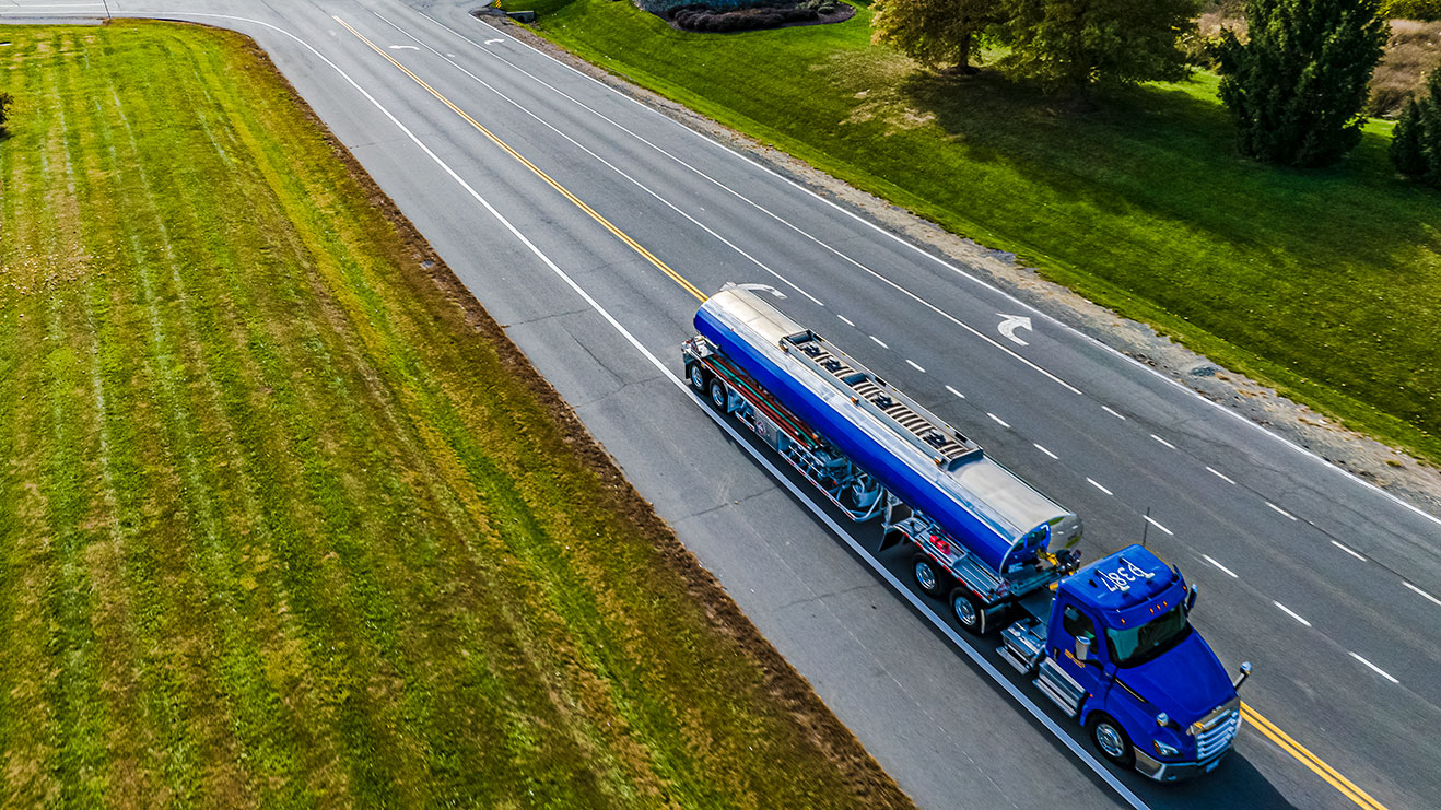 Blue fuel delivery truck